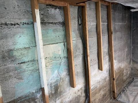 Before: leaking basement wall crack repair with carbon fiber structural reinforcement in Bronx, NY