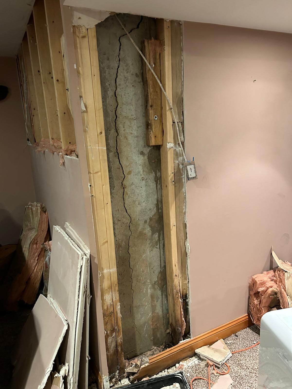 Before: outer corner foundation crack repair with carbon fiber strap reinforcement in Katonah, NY