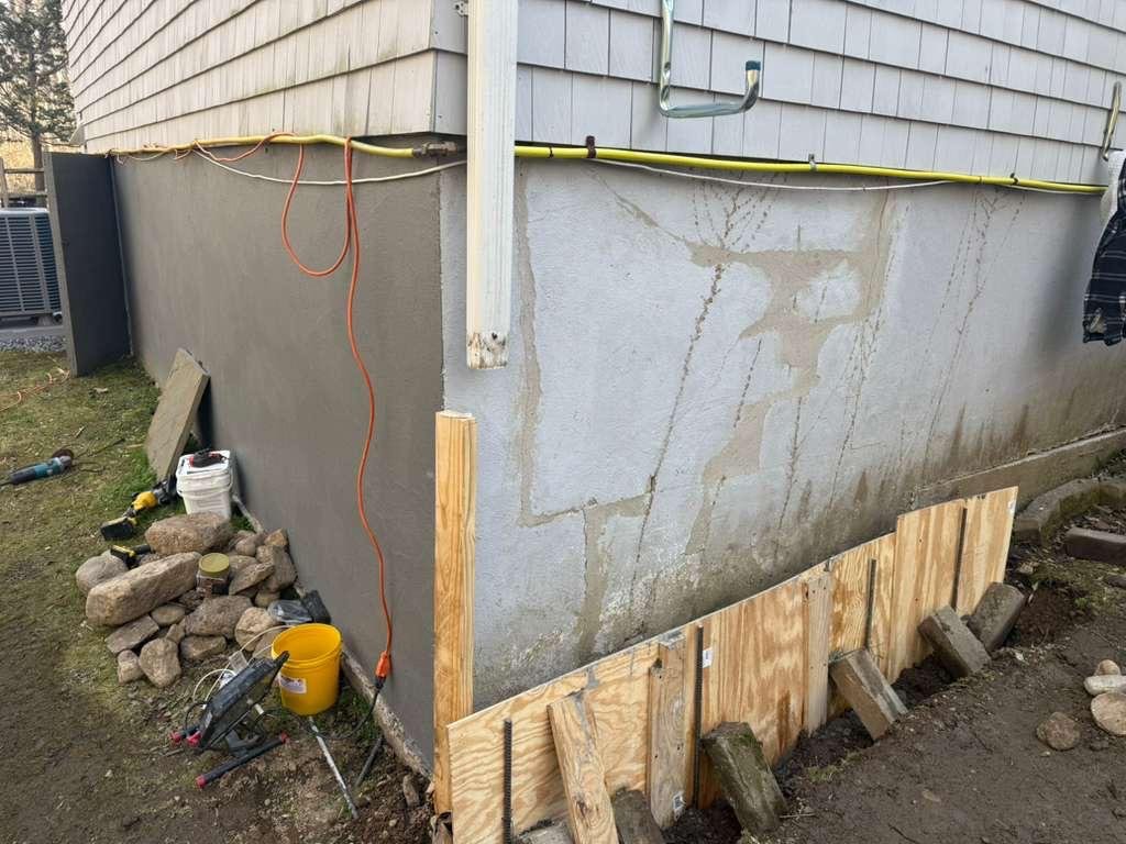 Job-site photo 2: missing foundation footer rebuild with reinforced rebar and structural wall reinforcement in Norwalk, CT