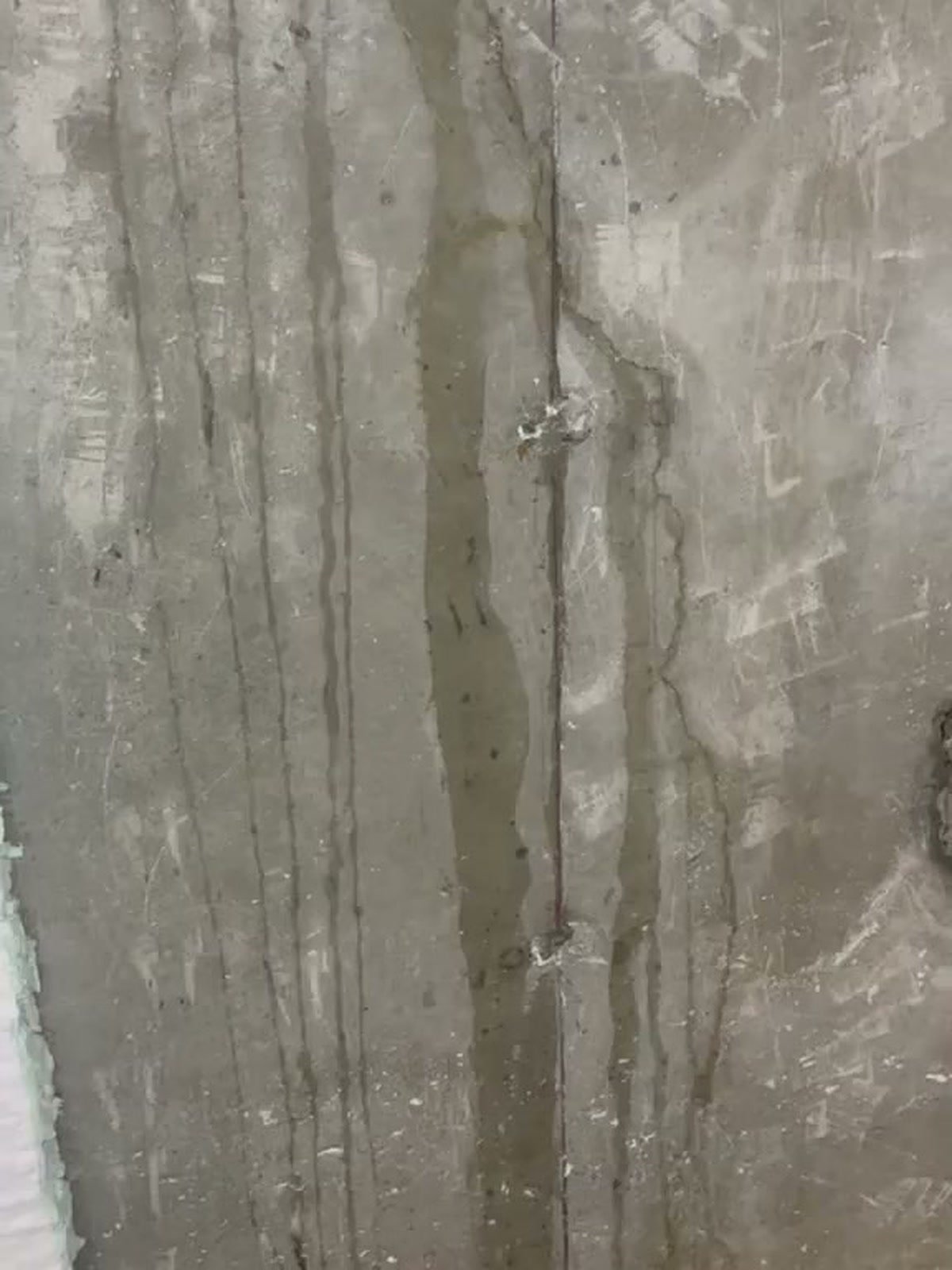 Before: leaking basement wall crack repair with carbon fiber reinforcement in Stamford, CT