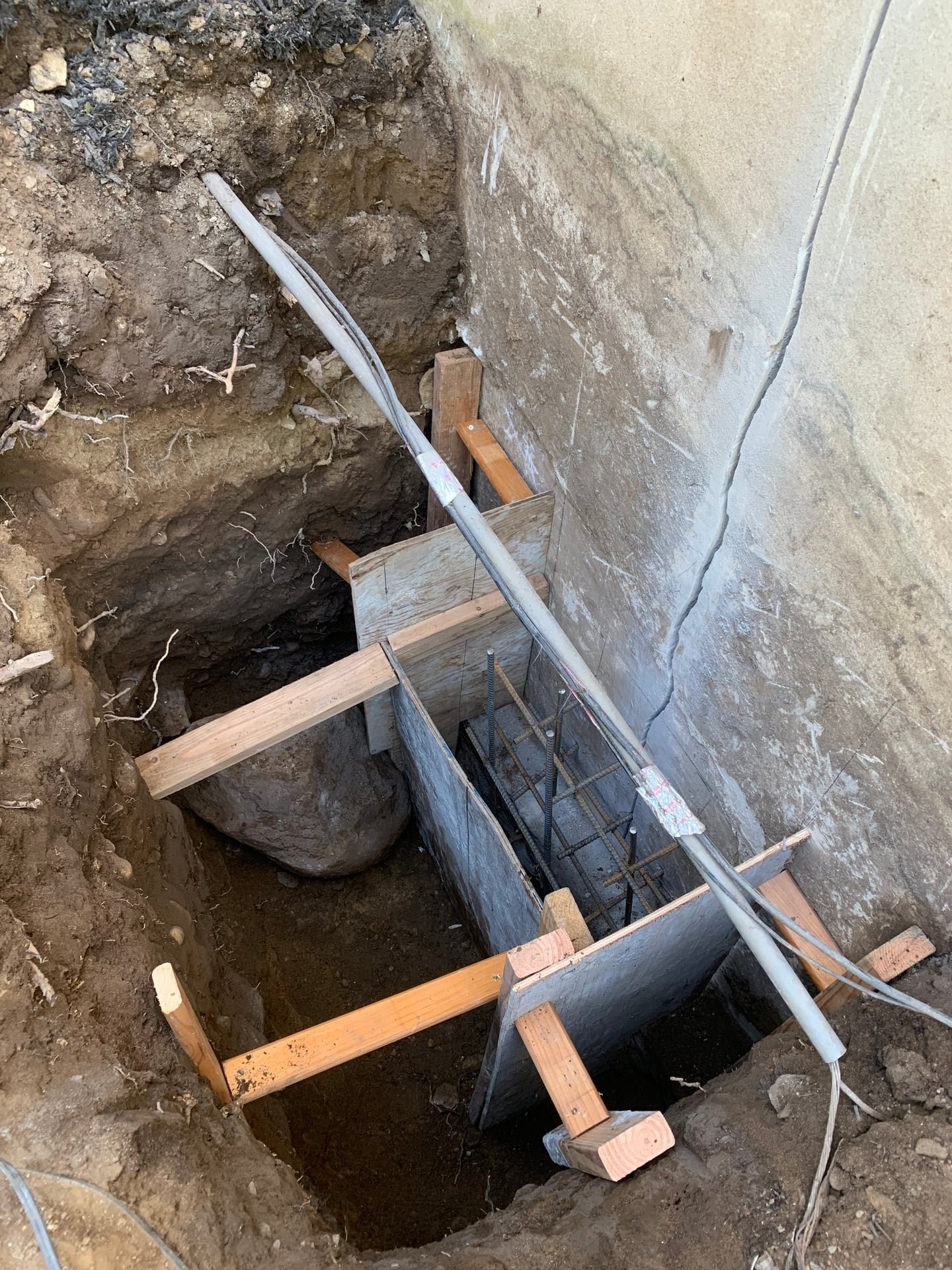 Before: undersized foundation footer rebuild with reinforced rebar and high-strength concrete in Westport, CT