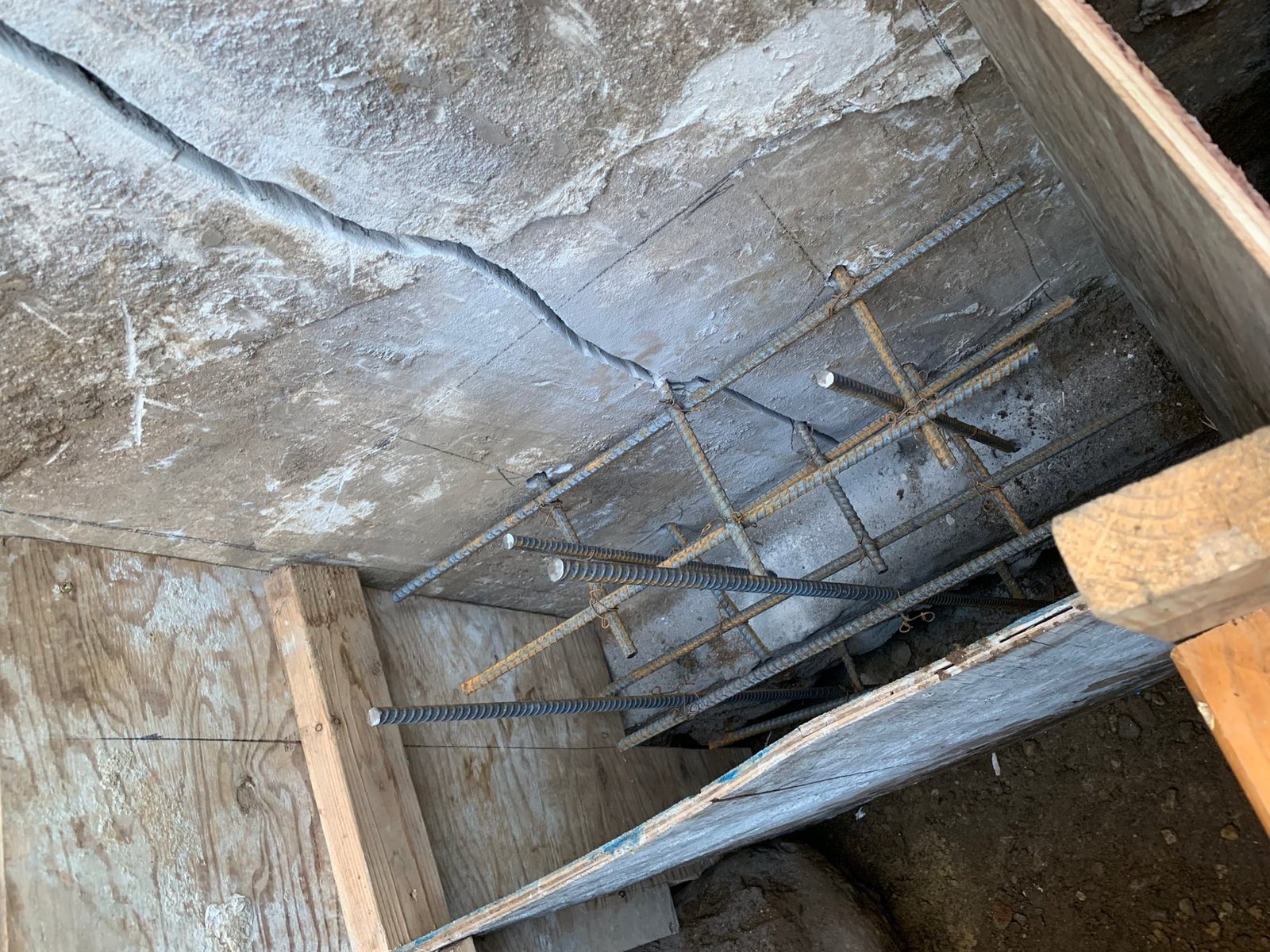 Job-site photo 1: undersized foundation footer rebuild with reinforced rebar and high-strength concrete in Westport, CT